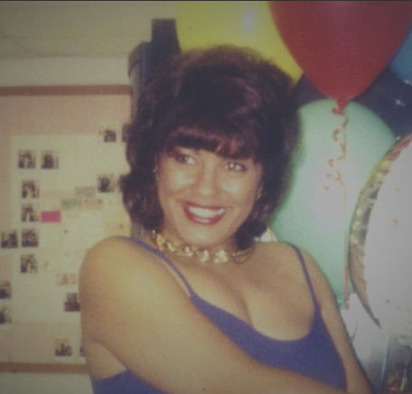 young, happy Angelina Rodriguez at a party.