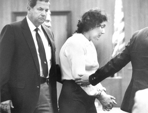 Handcuffed Judias Buenoano is led by US Marshal. Source: United States District Court.