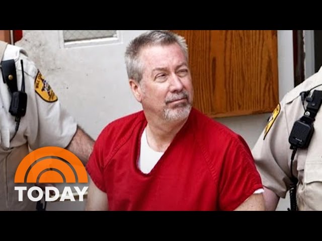 Drew Peterson escorted by guards